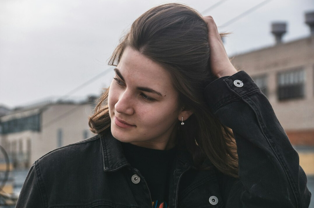 Portrait of a smiling young woman with brown hair