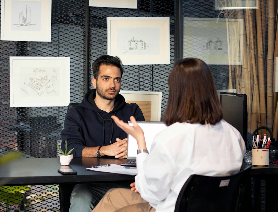insurance advisor talking to client